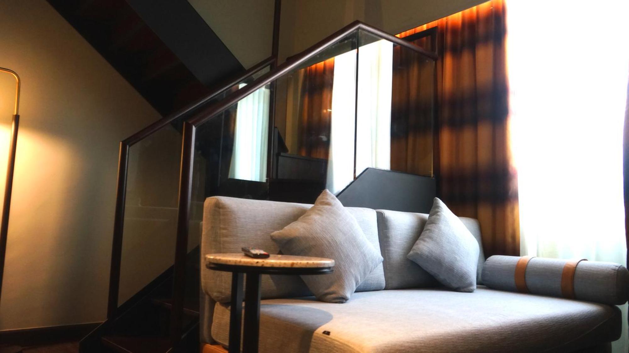 乔治敦 The George Penang By The Crest Collection酒店 外观 照片 A sofa in a hotel room